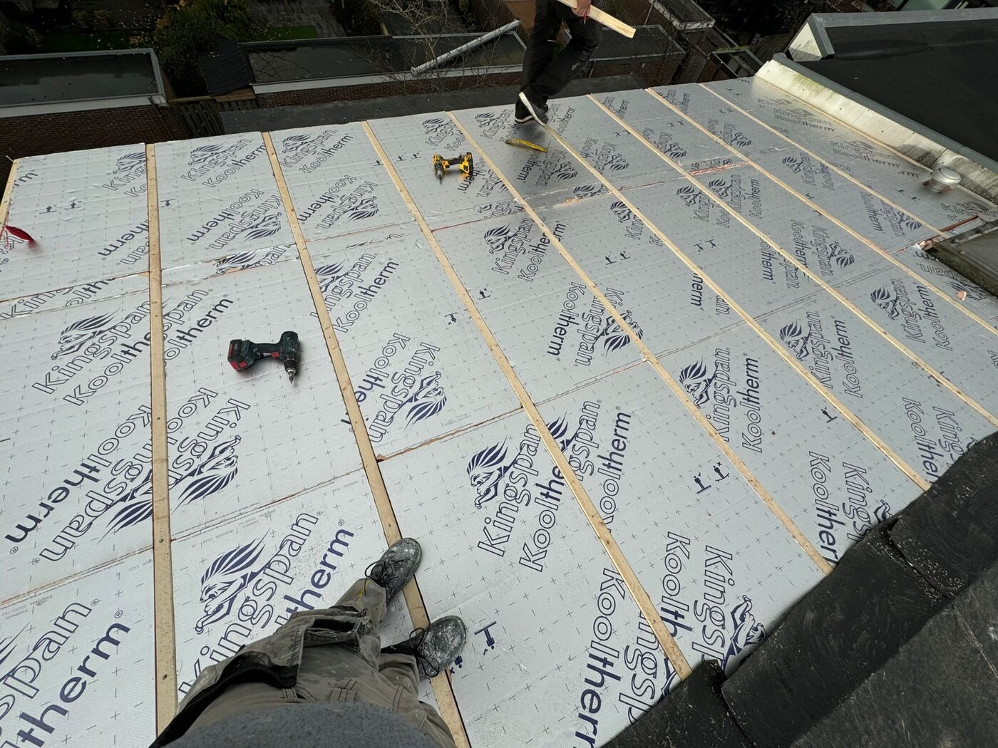 Insulation boards laid across the roof