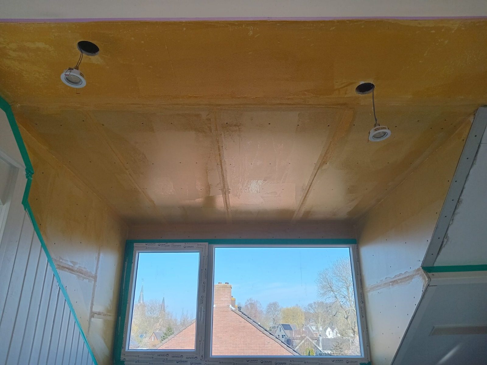 Before: the new dormer insulated and boarded inside, ready for plaster
