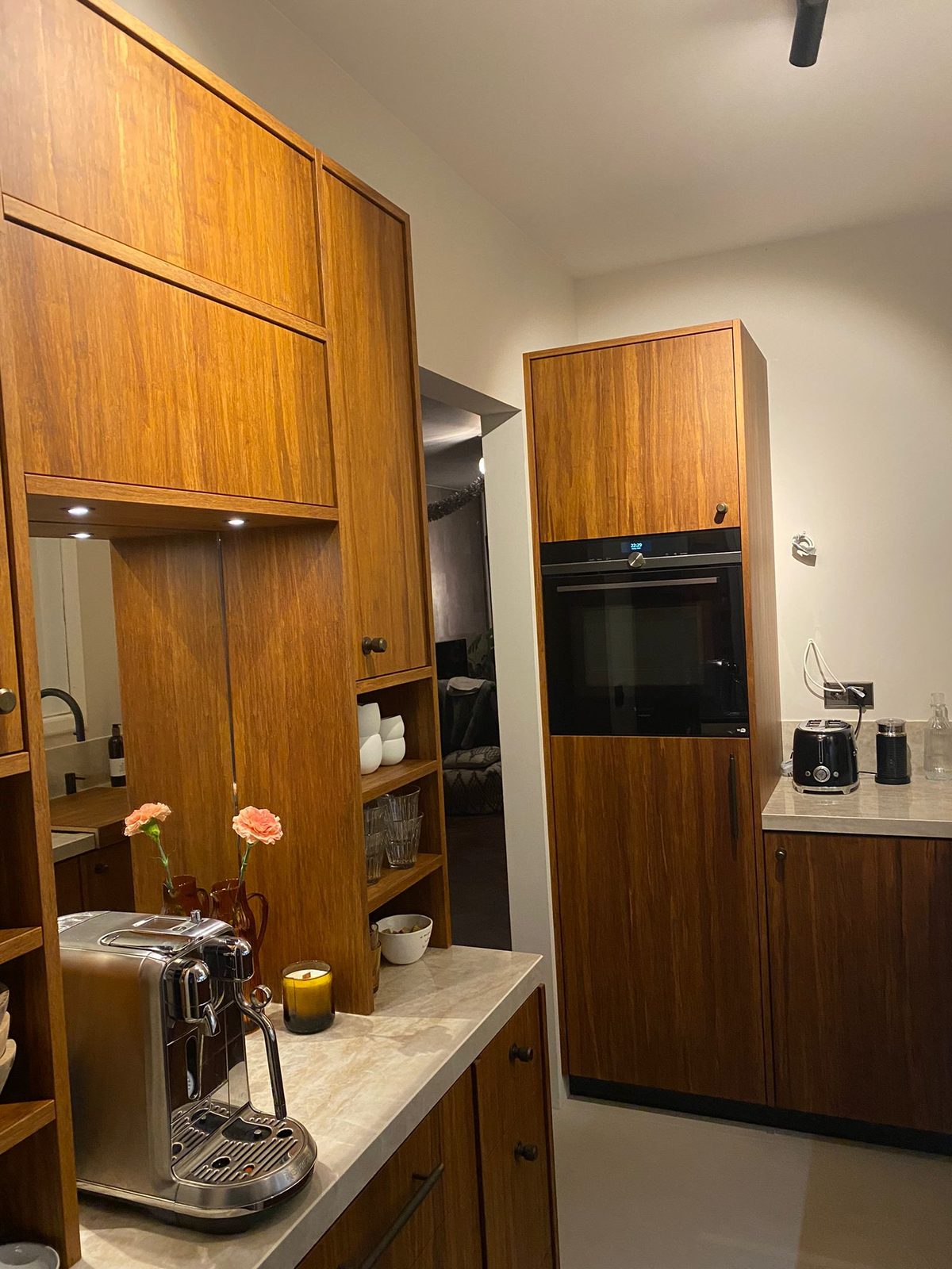 Walnut tall units with a built-in oven