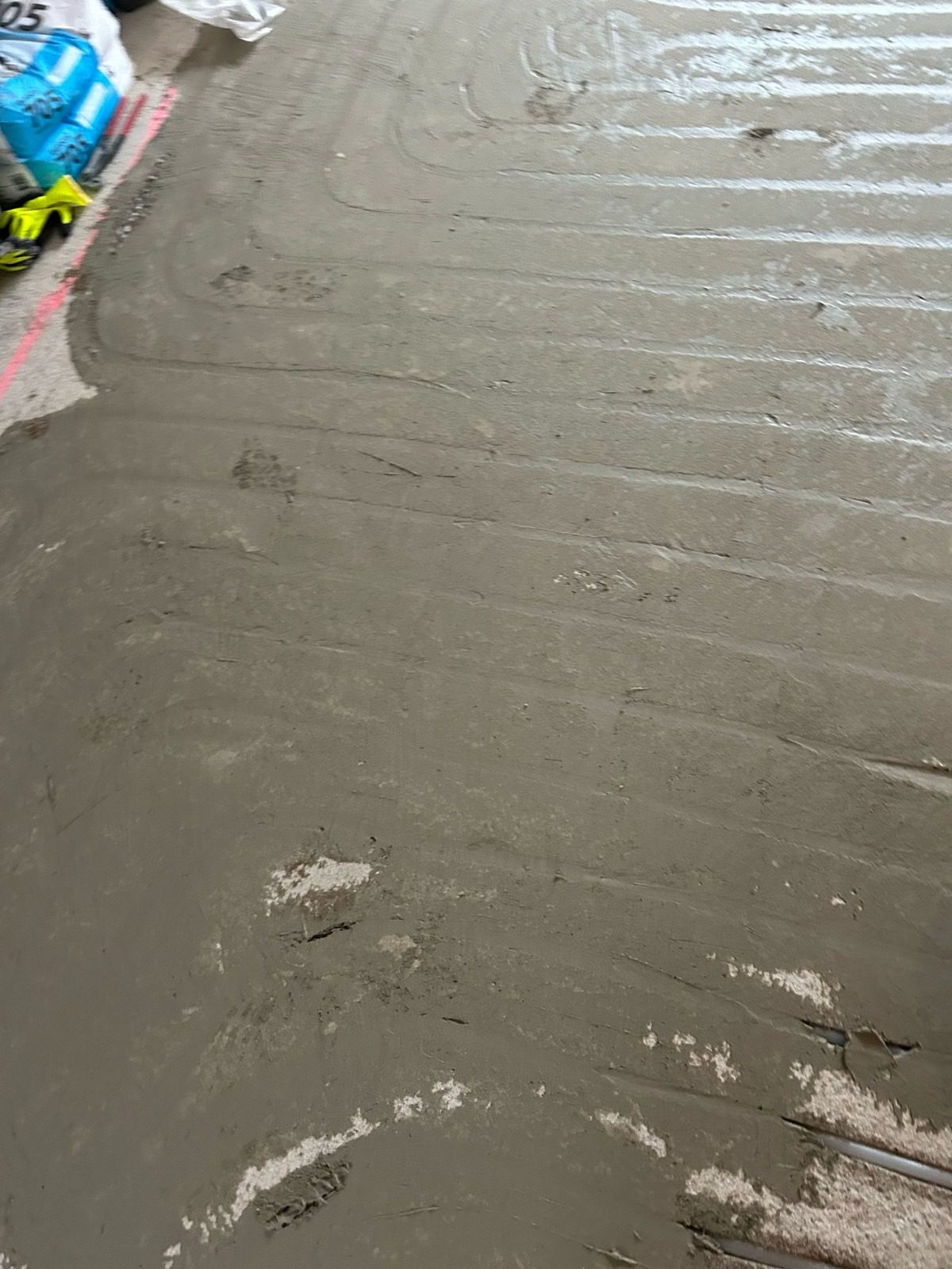 Milled channels in a floor, closed with mortar