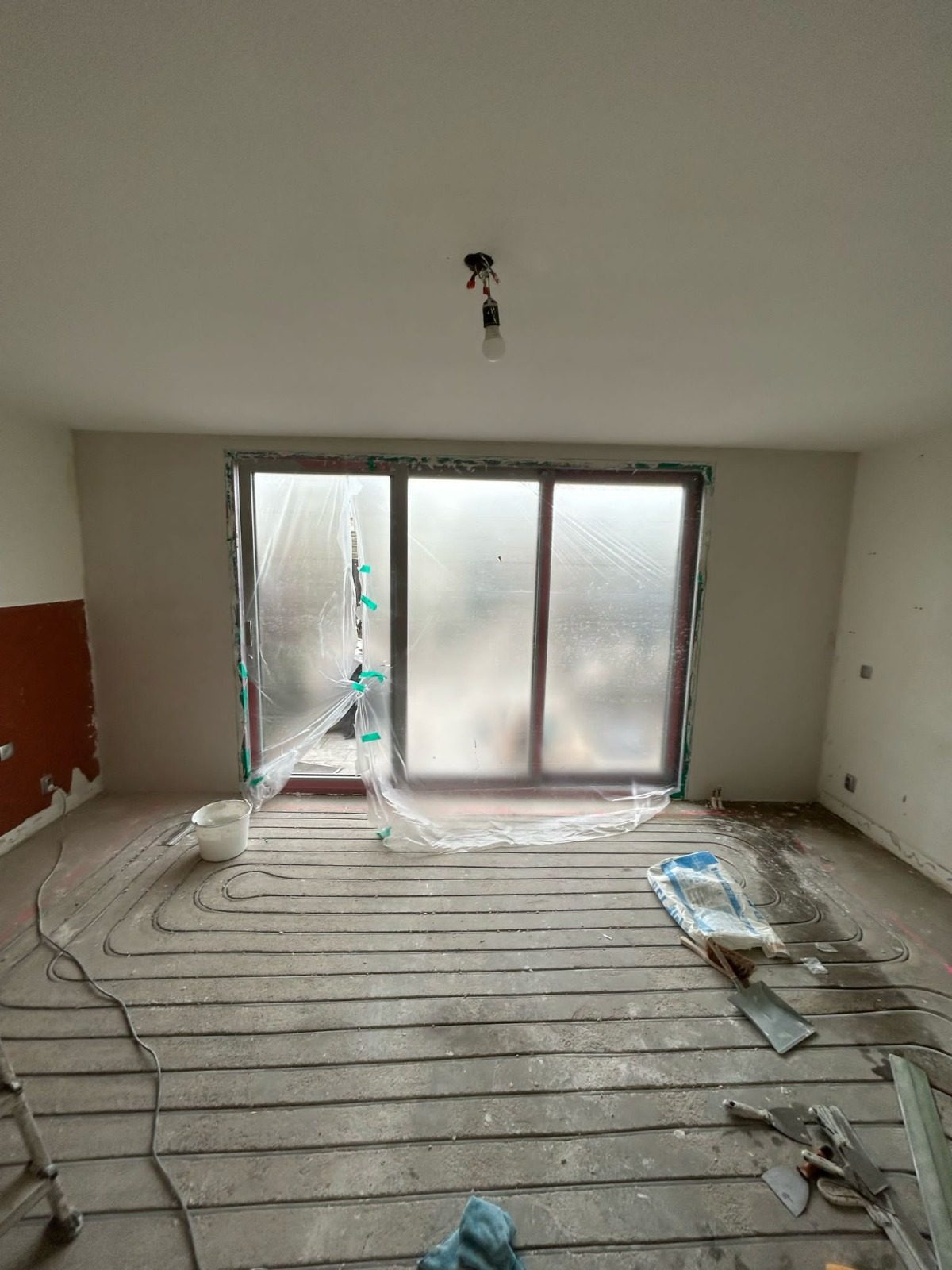 After: channels milled into the screed with the heating pipes laid in them